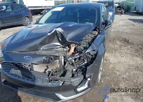 2019 Ford Fusion Hybrid Titanium from USA, damaged, VIN 3FA6P0RU3KR105328